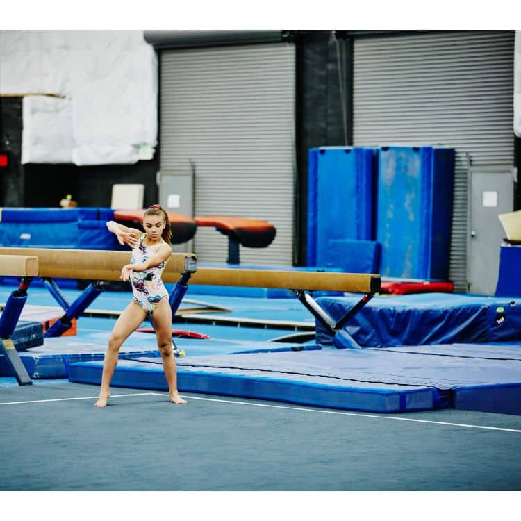 a gymnast practicing to floor music